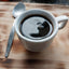 Cup of Brazilian café do ponto extraforte coffee with spoon
