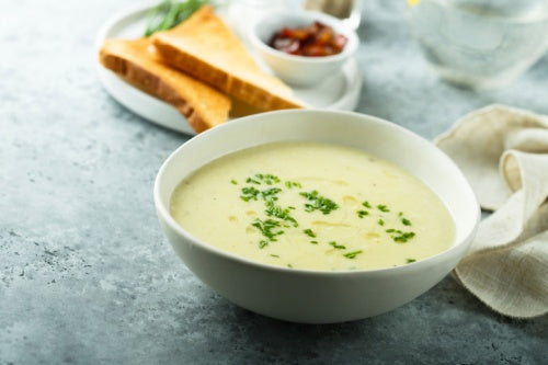 Monte Cudine Instant Asparagus Soup in white bowl