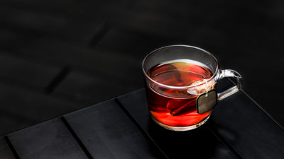 Glass mug with apple cinnamon tea