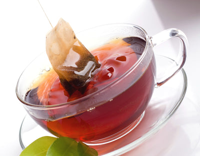 Glass cup of sugar balance blend tea