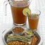 Peruvian pitcher and glass with emoliente, tray with ingredients to make emoliente 