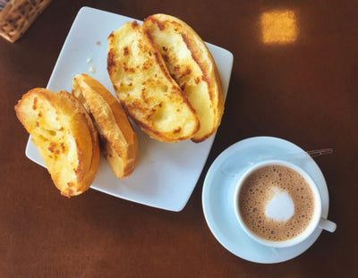 3 Coracoes Cappuccino Classic Brazilian breakfast, Capuccino and toasted bread with butter