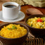 Café Aviacao Especial Coffee and corn couscous with egg in clay bowl.
