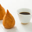 Brazilian Cafe Pilao Tradicional and Coxinha, a fried chicken finger food