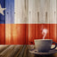 Cup of Nescafe Instantaneo Tradicion de Chile in front of Chilean flag