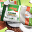 Dulzura coconut snacks with cut coconut in background