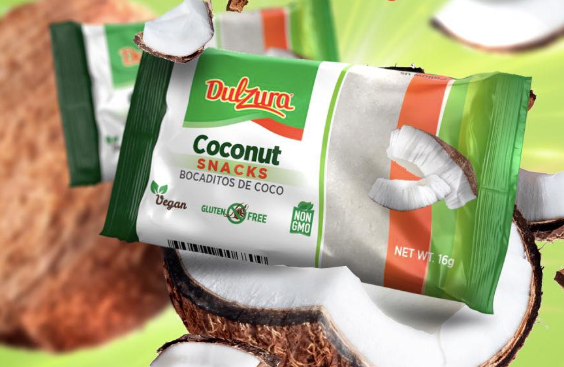 Dulzura coconut snacks with cut coconut in background