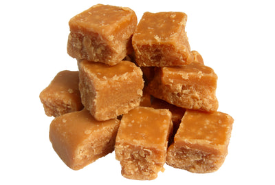 Dulceria Rodriguez dulce de leche milk fudge cut into pieces in pile with white background