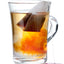 Glass mug of antigripal tea with tea bag 