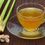 Glass cup of lemon grass tea and lemon grass.