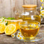 Cup of tea with lemon honey and flowers